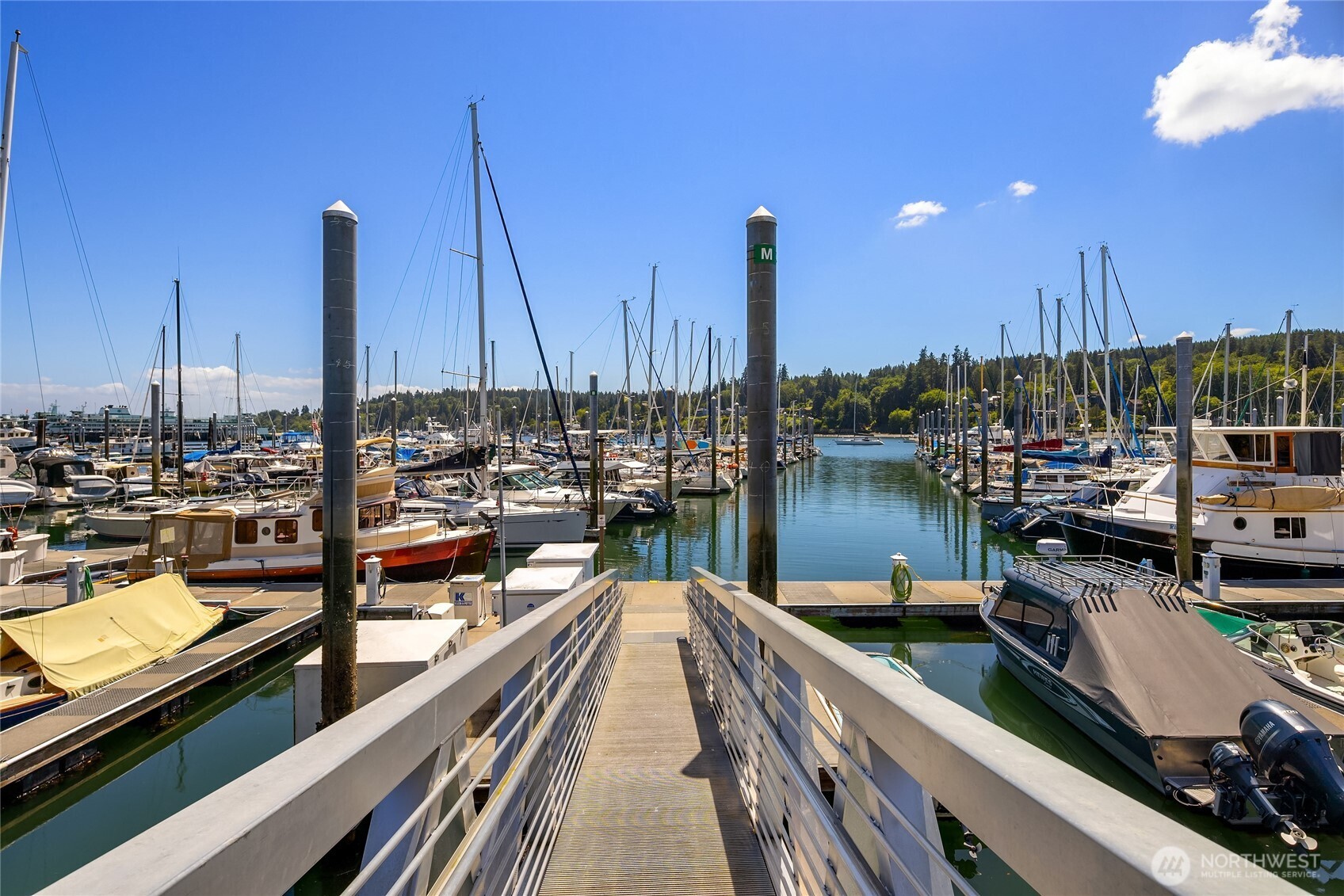 141 Parfitt Way Southwest, Unit C39 Bainbridge Island, WA 98110 - Photo 20 of 27 a view of a lake from a balcony