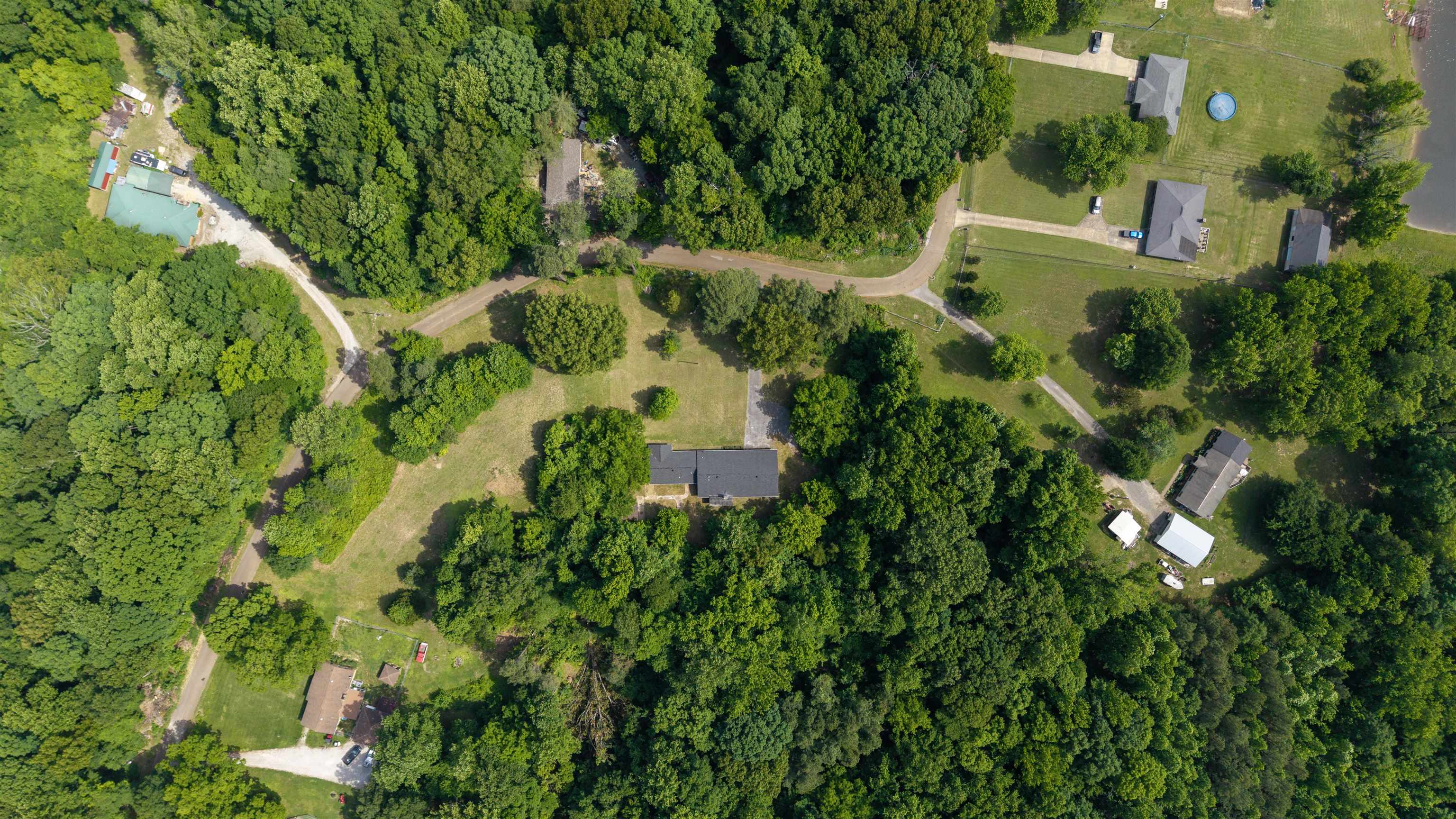 1296 Monasco Road Millington, TN 38053 - Photo 29 of 32 an aerial view of residential house with outdoor space and trees all around