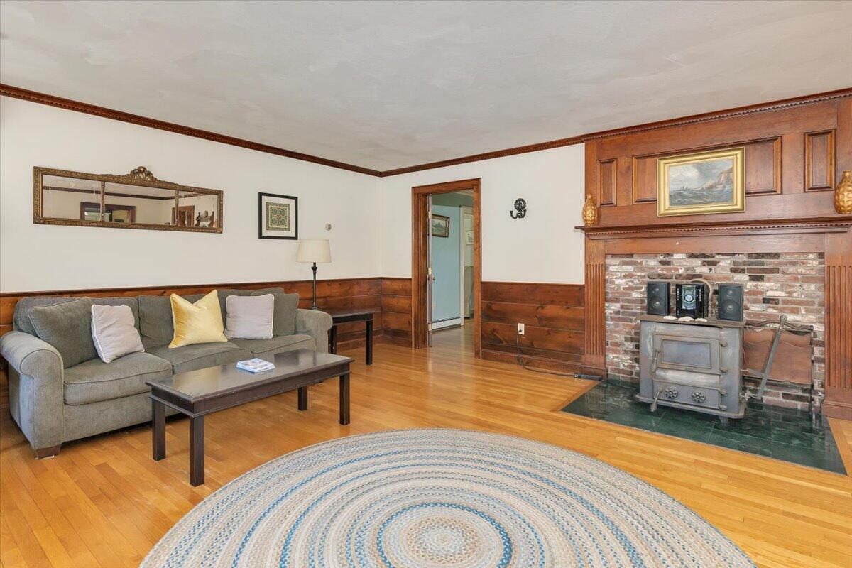 60 Pleasant Point Road Wellfleet, MA 02667 - Photo 20 of 58 a living room with furniture and a wooden floor