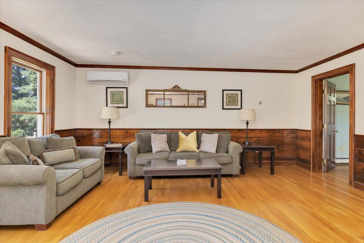 60 Pleasant Point Road Wellfleet, MA 02667 - Photo 21 of 58 a living room with furniture and a table