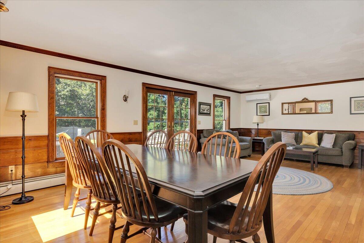 60 Pleasant Point Road Wellfleet, MA 02667 - Photo 22 of 58 a view of a dining room with furniture window and outside view