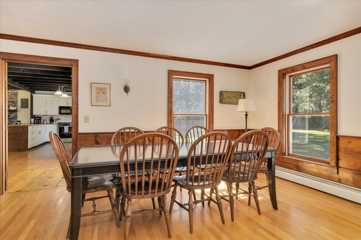 60 Pleasant Point Road Wellfleet, MA 02667 - Photo 23 of 58 a view of a dining room with furniture window and wooden floor