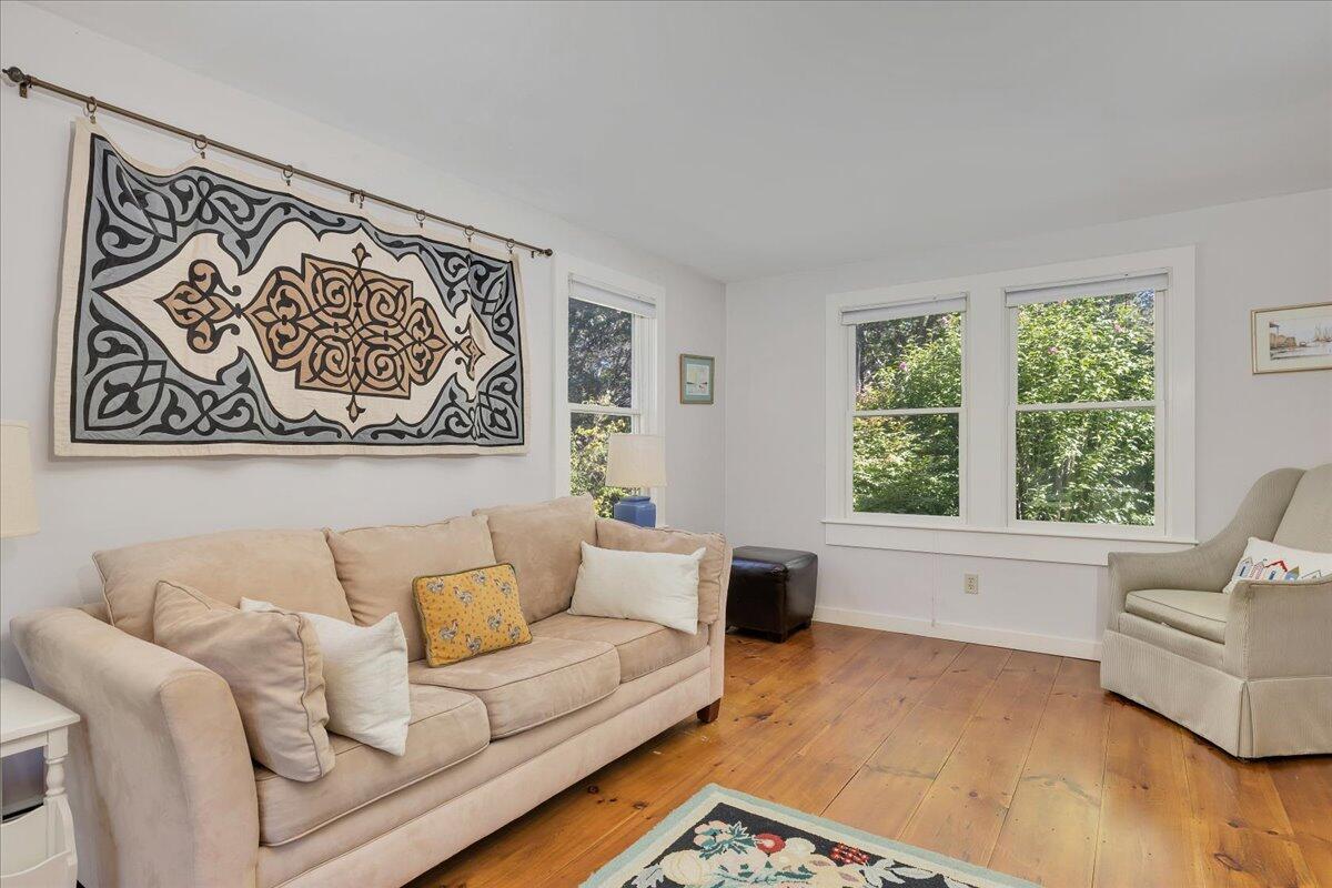 60 Pleasant Point Road Wellfleet, MA 02667 - Photo 28 of 58 a living room with furniture and a large window
