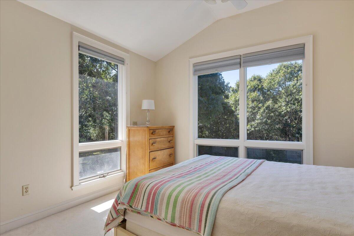 60 Pleasant Point Road Wellfleet, MA 02667 - Photo 36 of 58 a bedroom with a bed and a large window