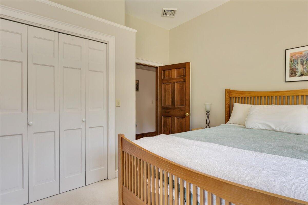 60 Pleasant Point Road Wellfleet, MA 02667 - Photo 37 of 58 a bedroom with a bed and a closet