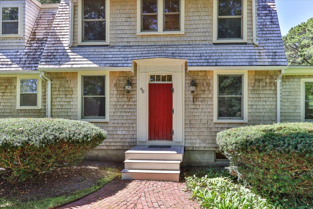 60 Pleasant Point Road Wellfleet, MA 02667 - Photo 4 of 58 a front view of a house