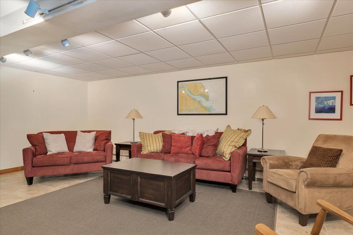 60 Pleasant Point Road Wellfleet, MA 02667 - Photo 43 of 58 a living room with furniture and a couch