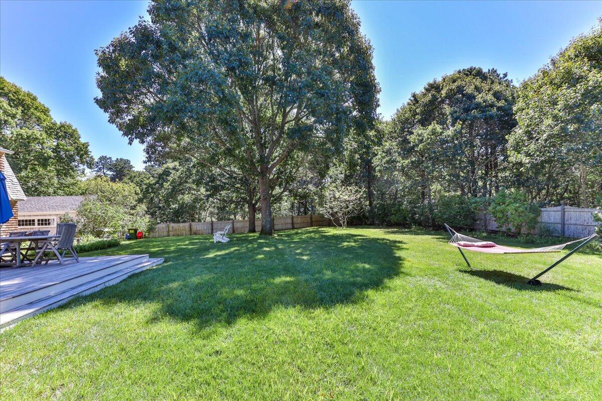 60 Pleasant Point Road Wellfleet, MA 02667 - Photo 8 of 58 a view of a backyard with swimming pool