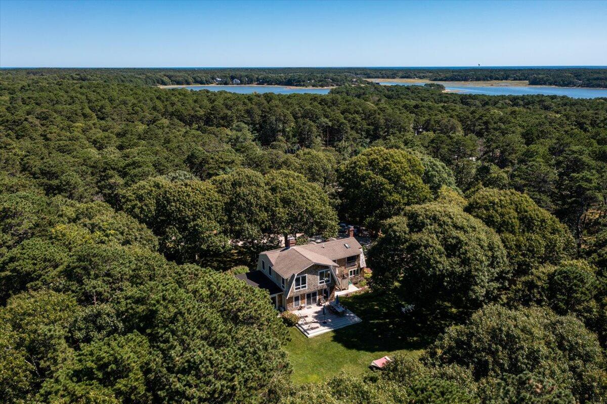 60 Pleasant Point Road Wellfleet, MA 02667 - Photo 10 of 58 an aerial view of a house with a yard
