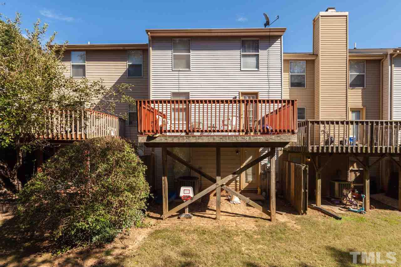 1702 Ithaca Lane Raleigh, NC 27606 - Photo 3 of 19 Large Deck & Grass Filled Yard