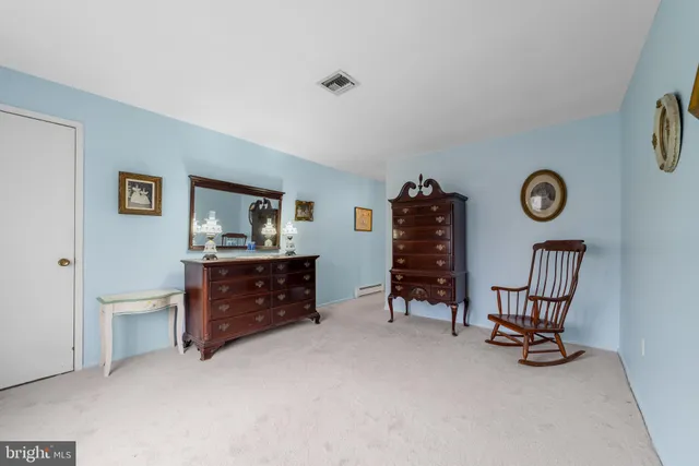 a view of a workspace with furniture