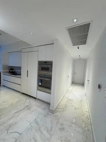 a view of a room with an empty space