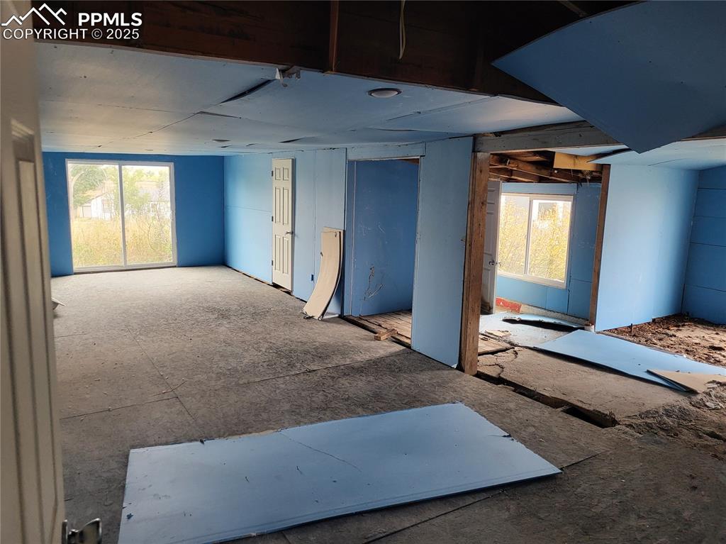 37131 Highway 24 Matheson, CO 80830 - Photo 4 of 12 a bedroom with a bed and window