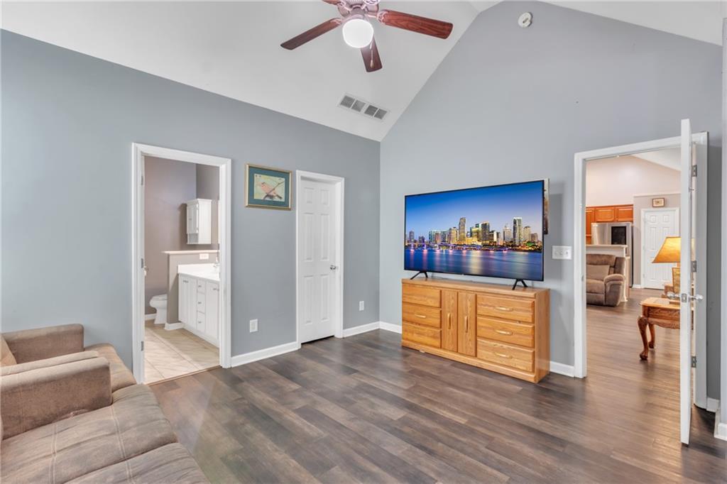 4044 Amberleigh Trace Gainesville, GA 30507 - Photo 19 of 21 a living room with furniture and wooden floor