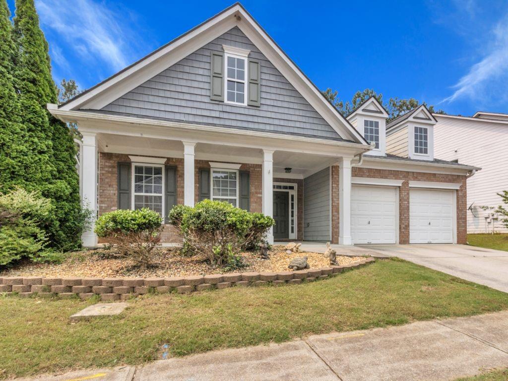 4044 Amberleigh Trace Gainesville, GA 30507 - Photo 2 of 21 a view of a house with swimming pool in front of it