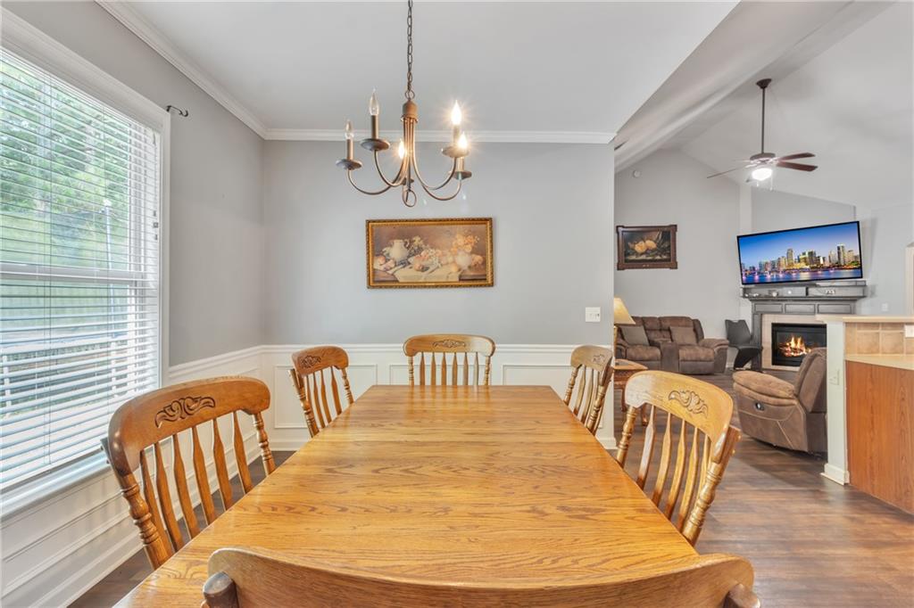 4044 Amberleigh Trace Gainesville, GA 30507 - Photo 8 of 21 a view of a dining room with furniture