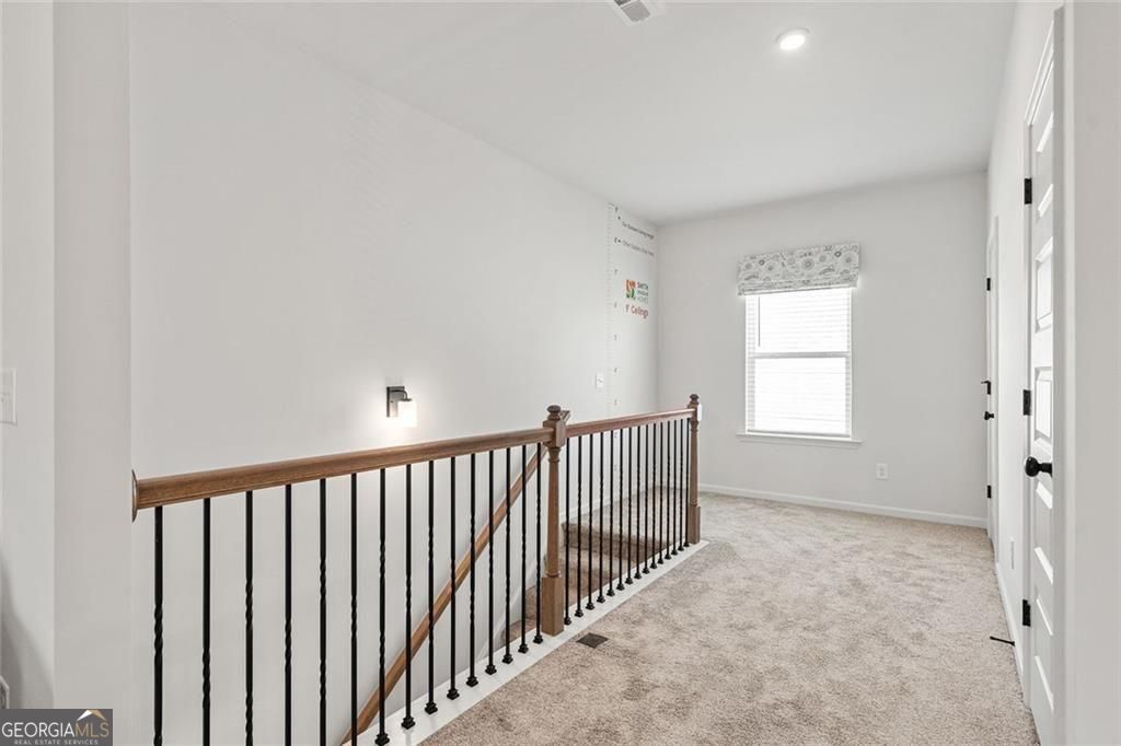 200 Roy Drive Calhoun, GA 30701 - Photo 20 of 29 a view of a hallway with a window