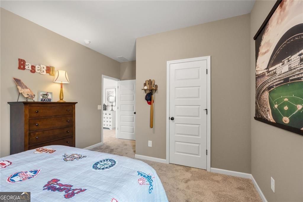 200 Roy Drive Calhoun, GA 30701 - Photo 25 of 29 a bedroom with a bed and furniture