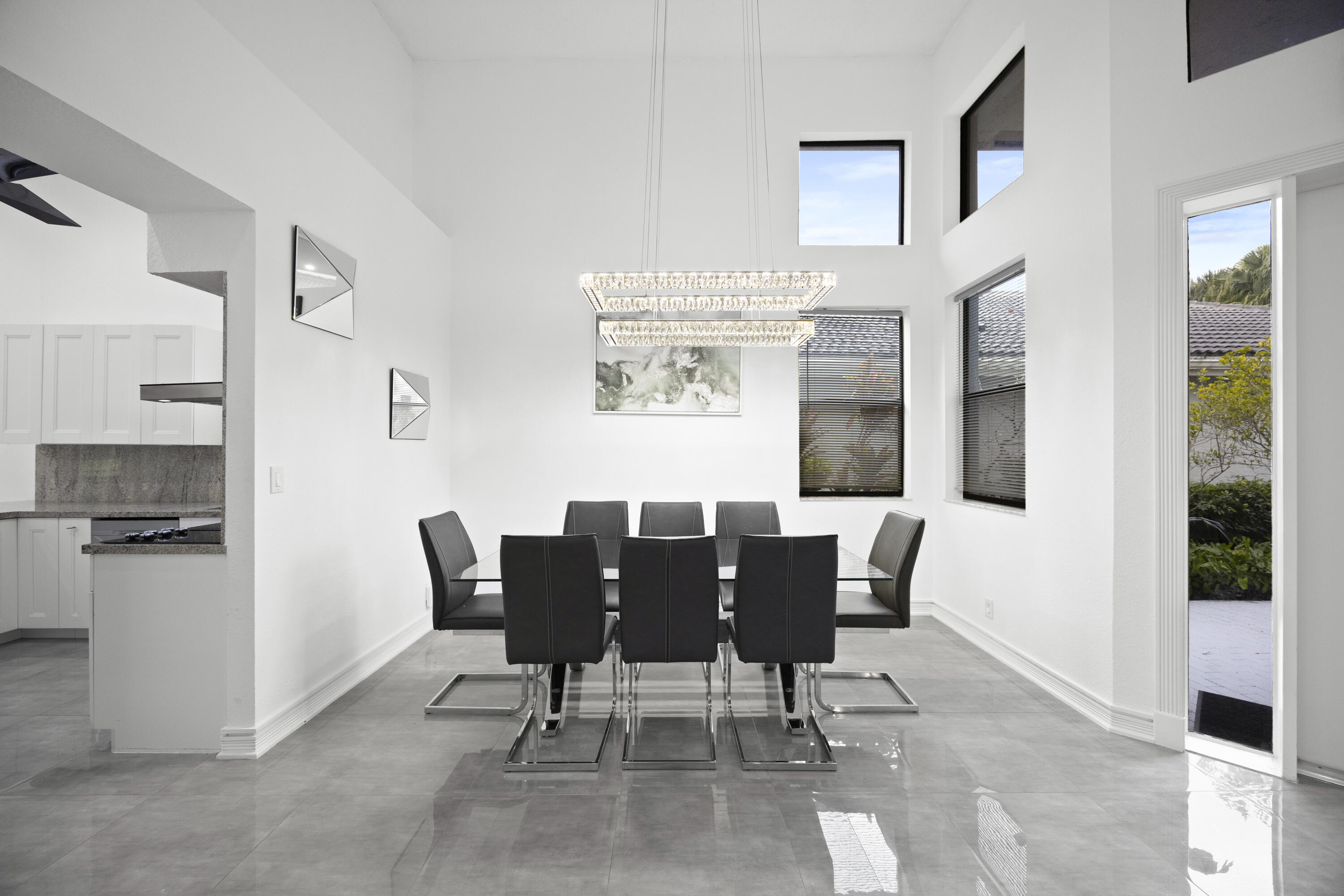 10106 Spyglass Way Boca Raton, FL 33498 - Photo 40 of 56 a view of a dining room with furniture