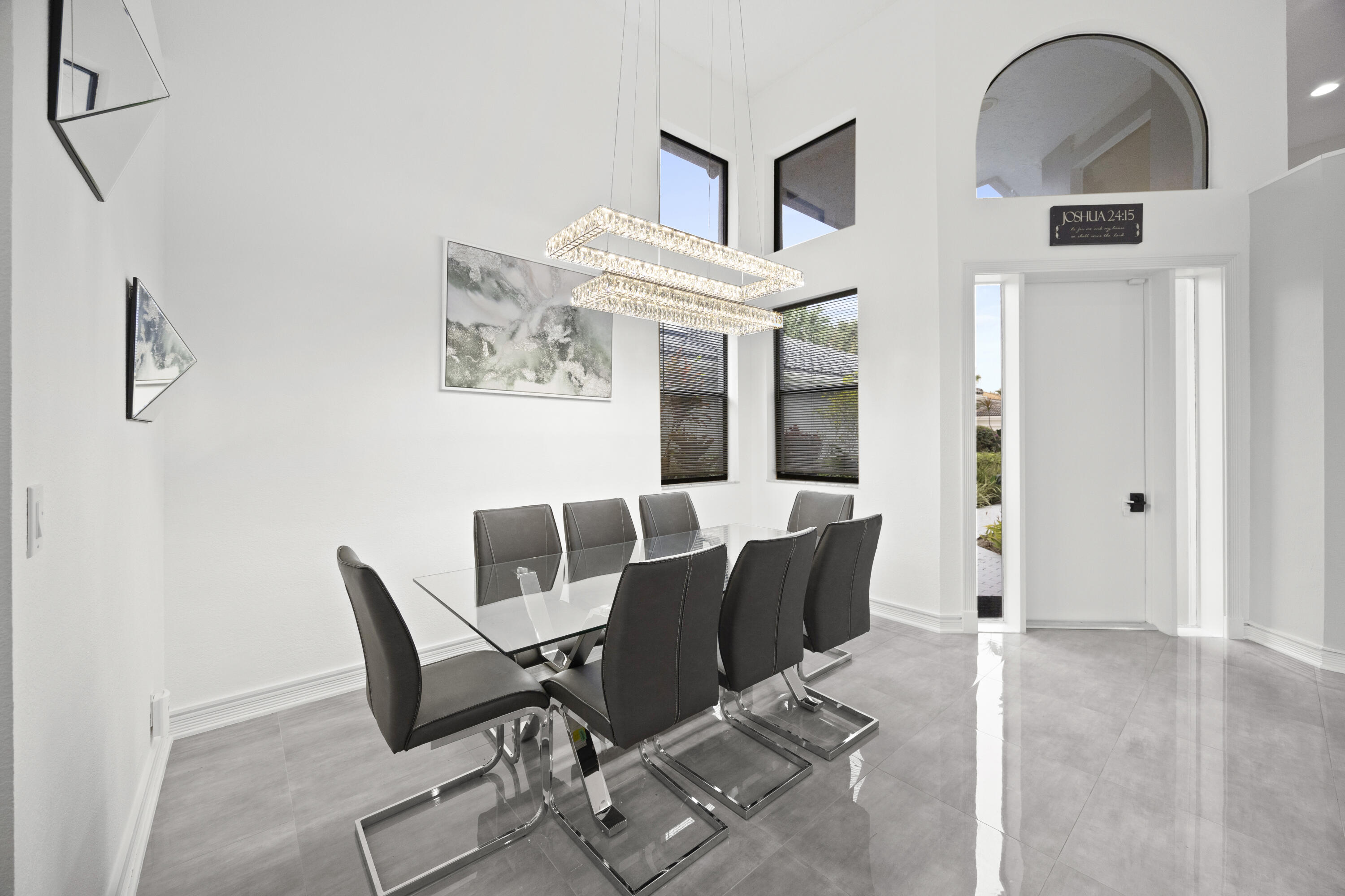 10106 Spyglass Way Boca Raton, FL 33498 - Photo 42 of 56 a view of a dining room with furniture