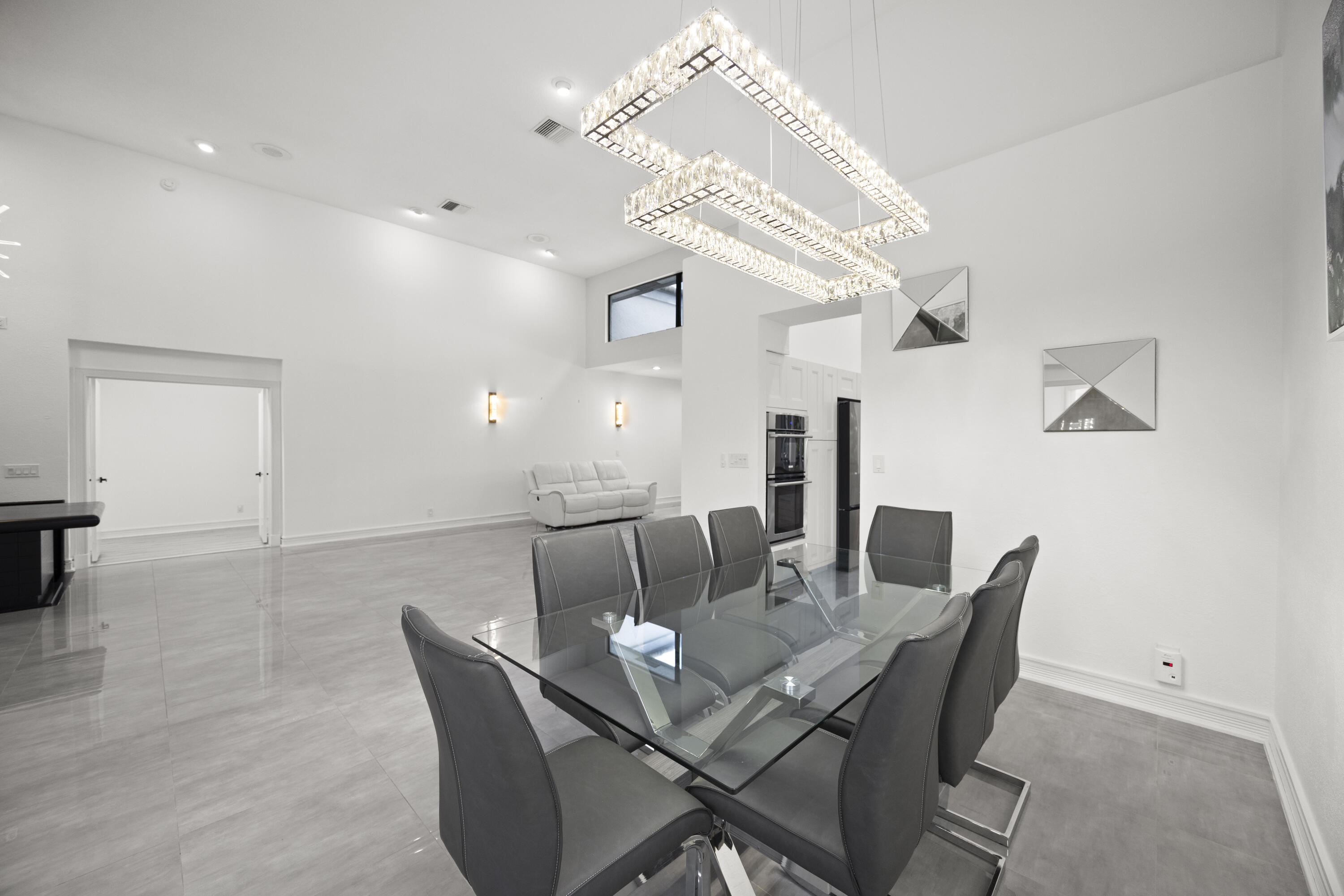 10106 Spyglass Way Boca Raton, FL 33498 - Photo 44 of 56 a view of a dining room with furniture