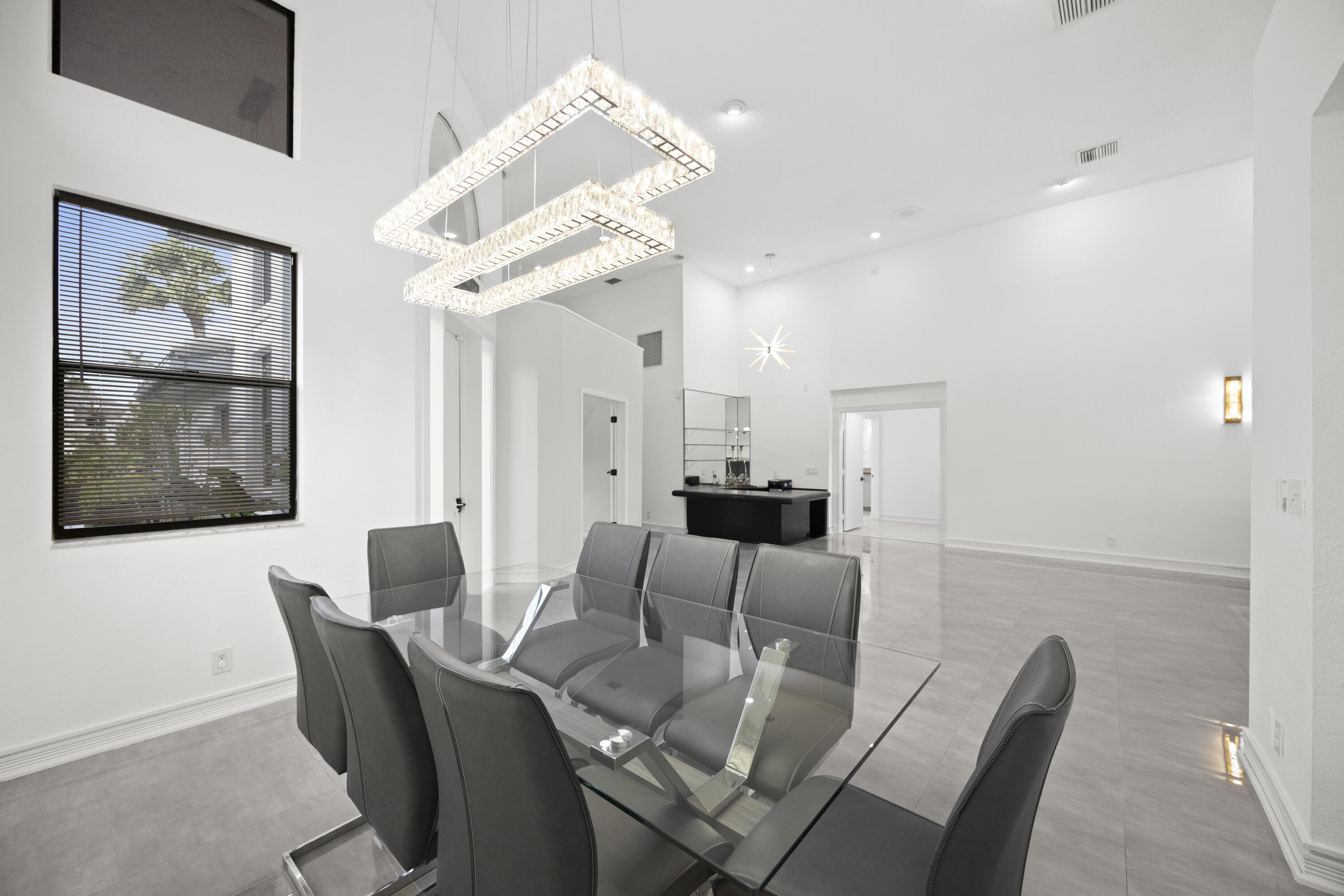 10106 Spyglass Way Boca Raton, FL 33498 - Photo 45 of 56 a view of a dining room with furniture
