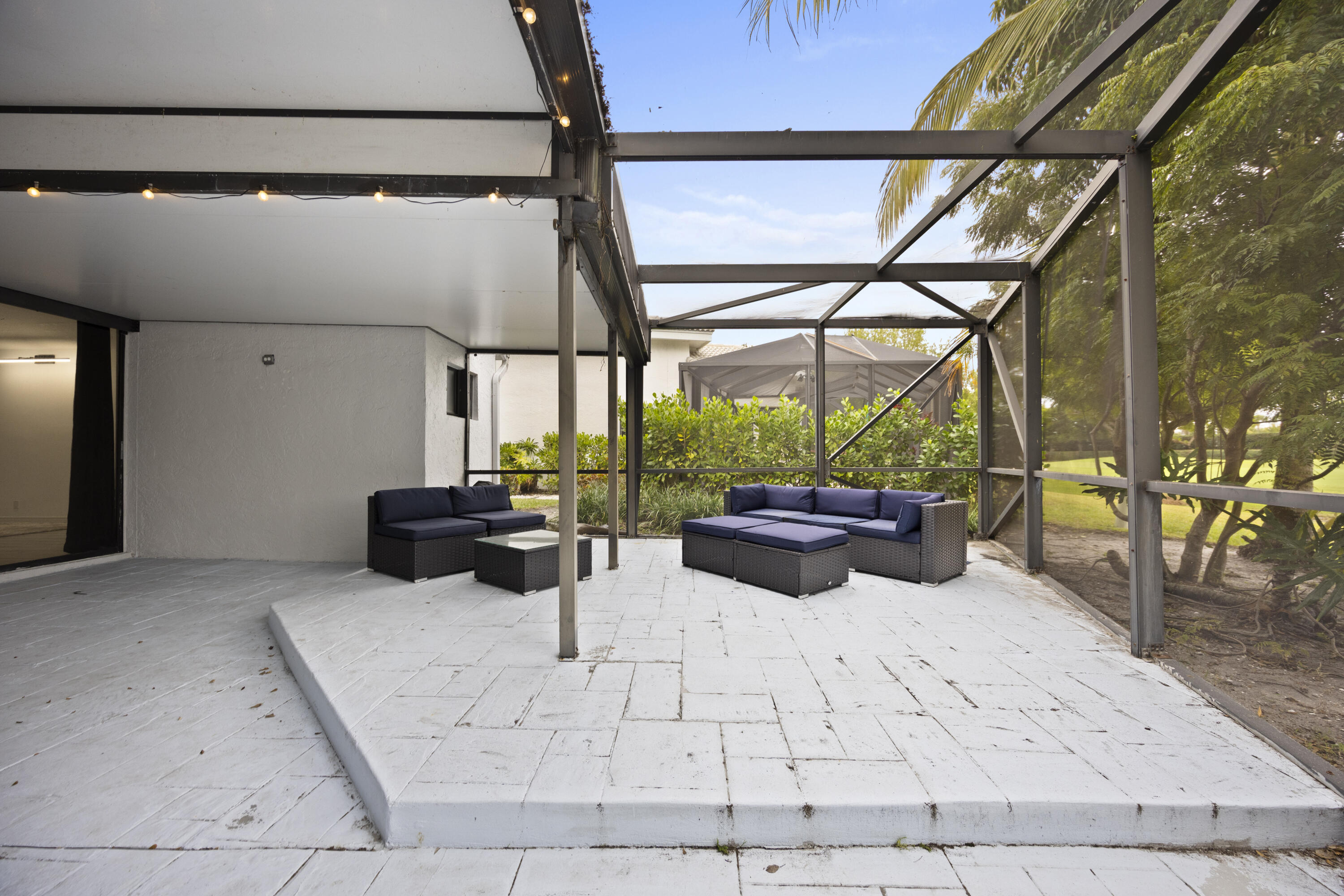 10106 Spyglass Way Boca Raton, FL 33498 - Photo 48 of 56 a view of an outdoor space with a couch