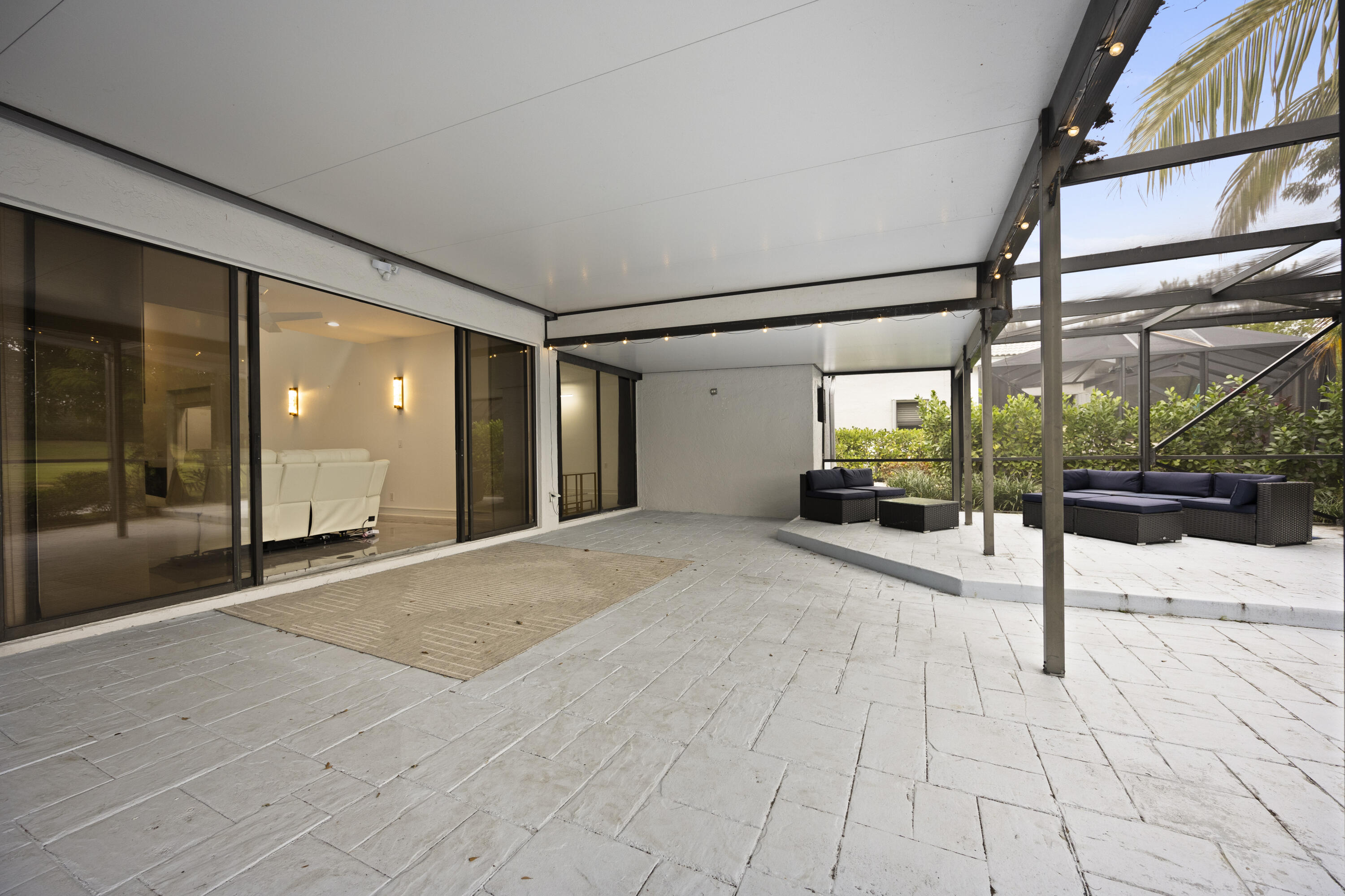 10106 Spyglass Way Boca Raton, FL 33498 - Photo 49 of 56 a lobby with glass door and glass door