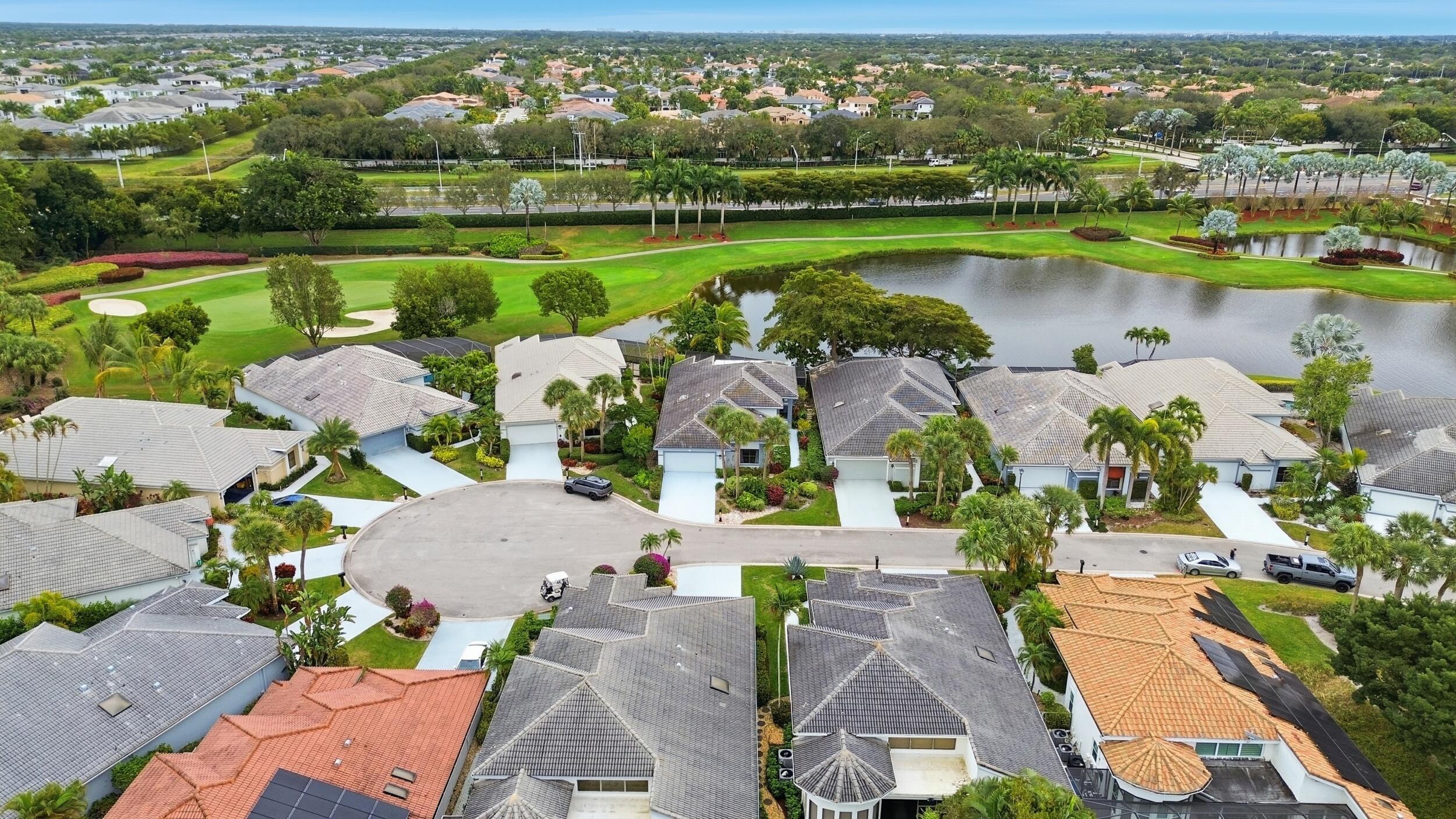10106 Spyglass Way Boca Raton, FL 33498 - Photo 51 of 56 an aerial view of a city with lake view