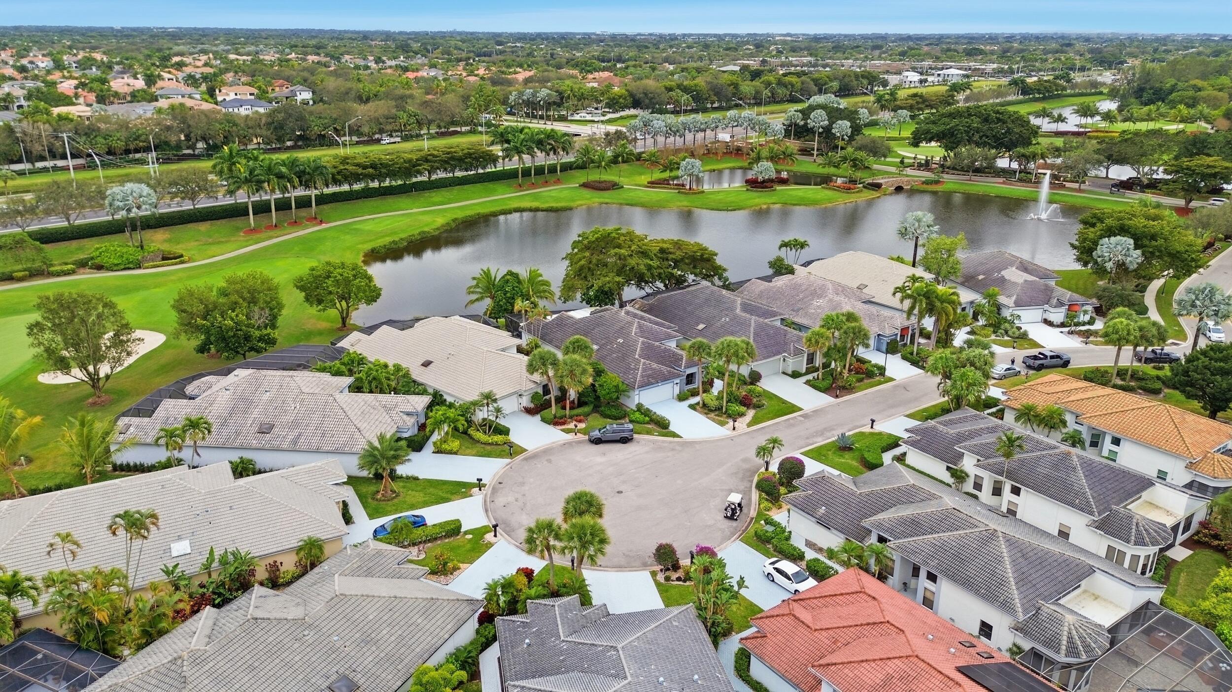 10106 Spyglass Way Boca Raton, FL 33498 - Photo 53 of 56 an aerial view of lake residential houses with outdoor space and river