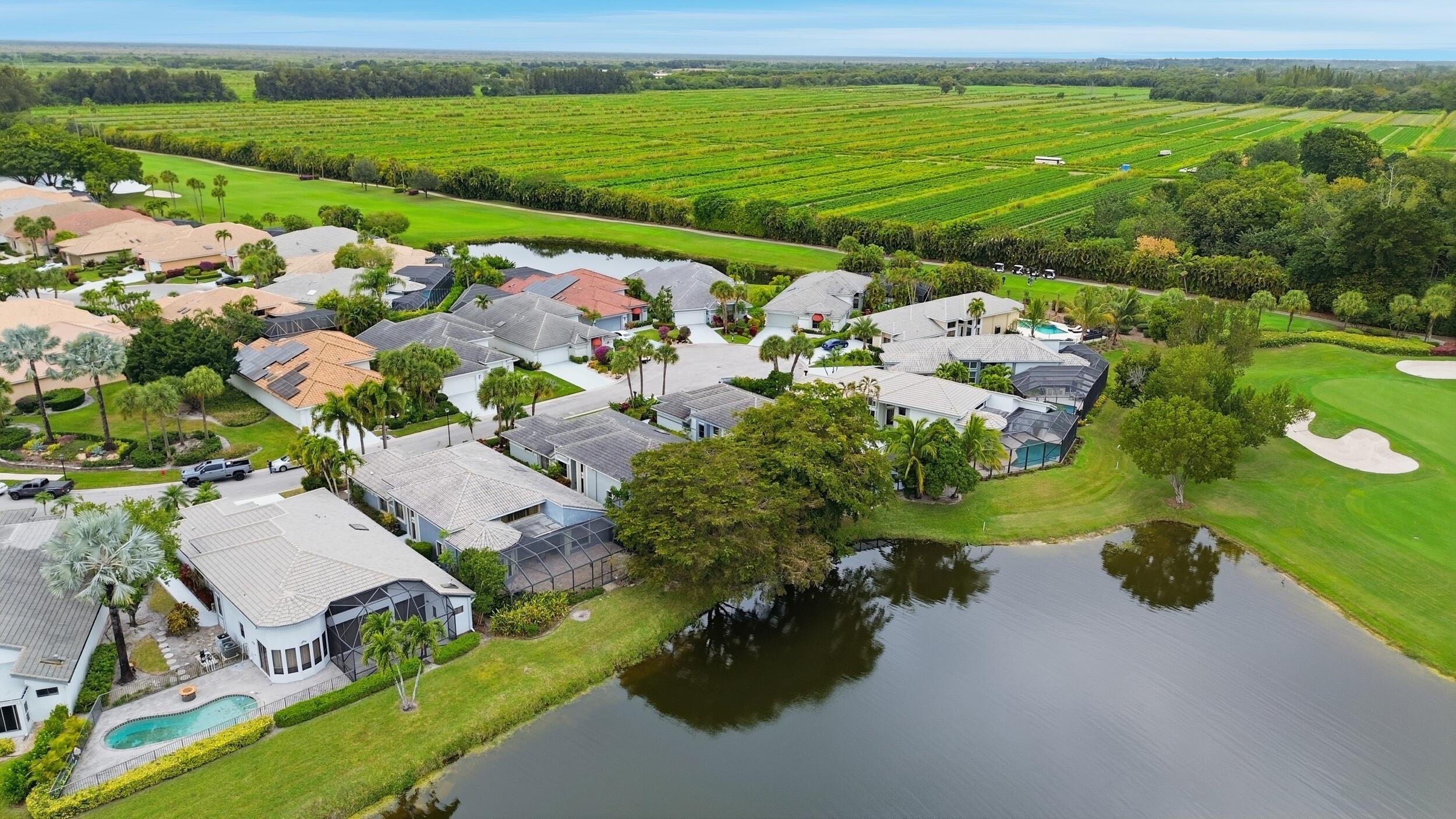 10106 Spyglass Way Boca Raton, FL 33498 - Photo 55 of 56 an aerial view of a house with a yard