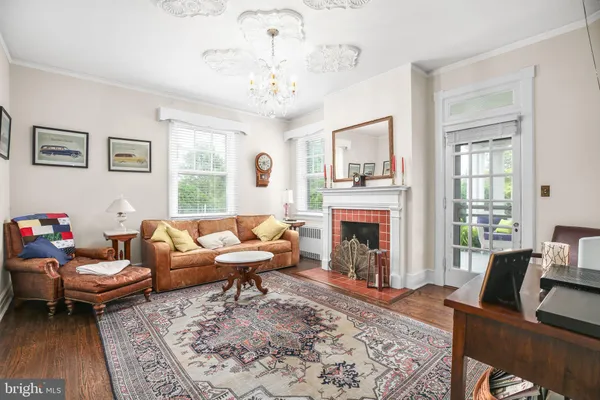 a view of an entryway and livingroom with furniture