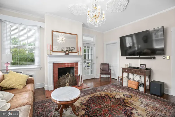 a bed room with a bed and a window