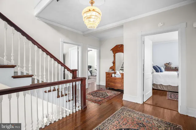 a bedroom with a bed and cabinets