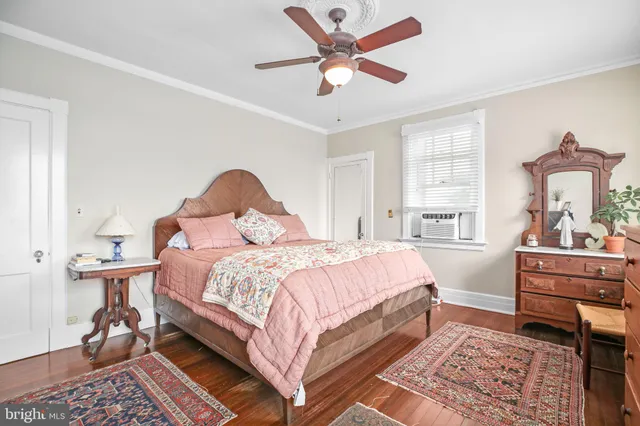 a view of entryway with wooden floor and stairs