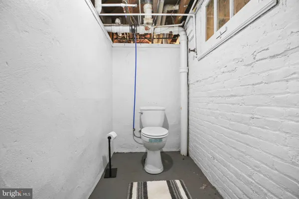 an aerial view of residential houses with outdoor space and swimming pool