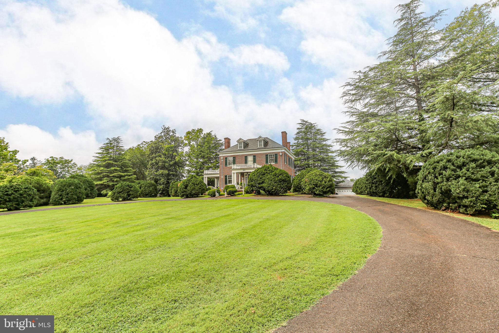 590 North Madison Road Orange, VA 22960 - Photo 72 of 88 a view of a big yard with plants and large trees