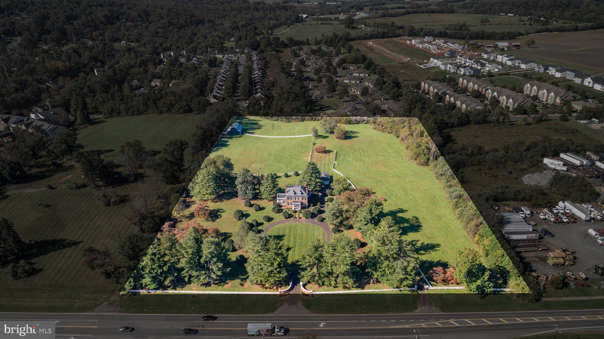 590 North Madison Road Orange, VA 22960 - Photo 79 of 88 an aerial view of a residential houses with yard