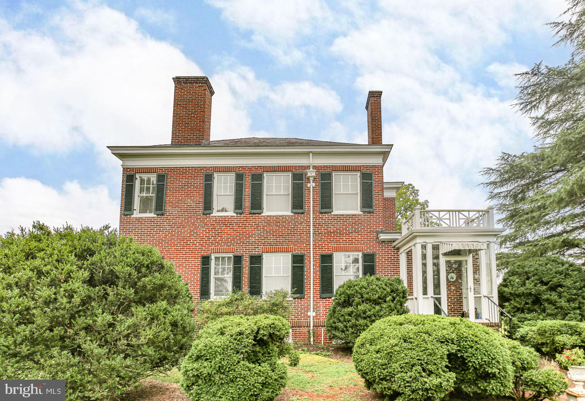 590 North Madison Road Orange, VA 22960 - Photo 8 of 88 a front view of a house with a yard