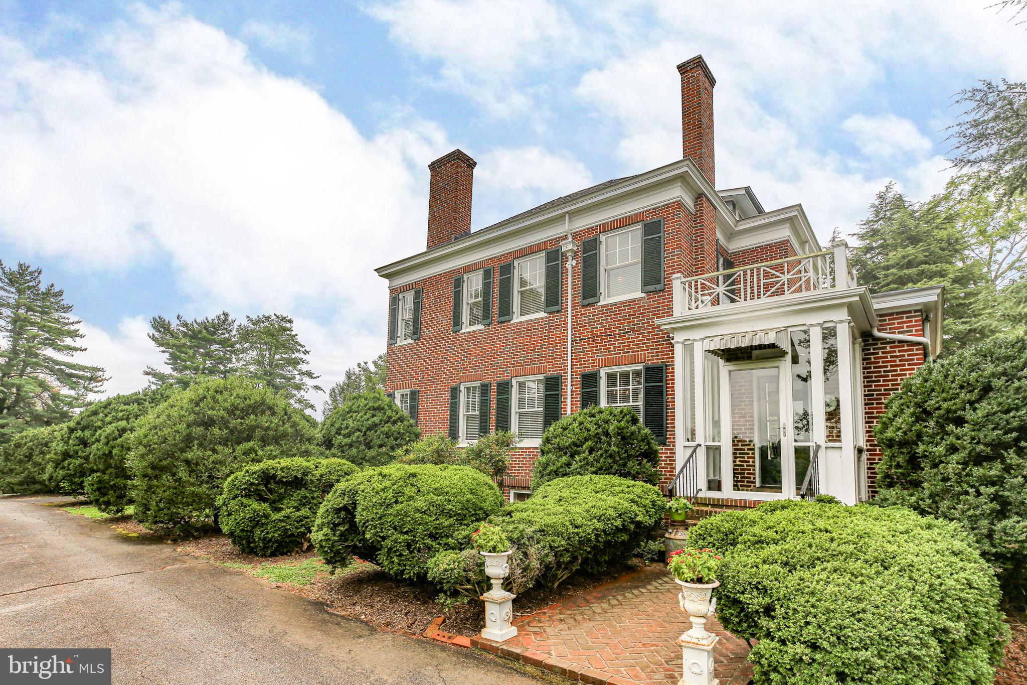 590 North Madison Road Orange, VA 22960 - Photo 9 of 88 a front view of a house with garden