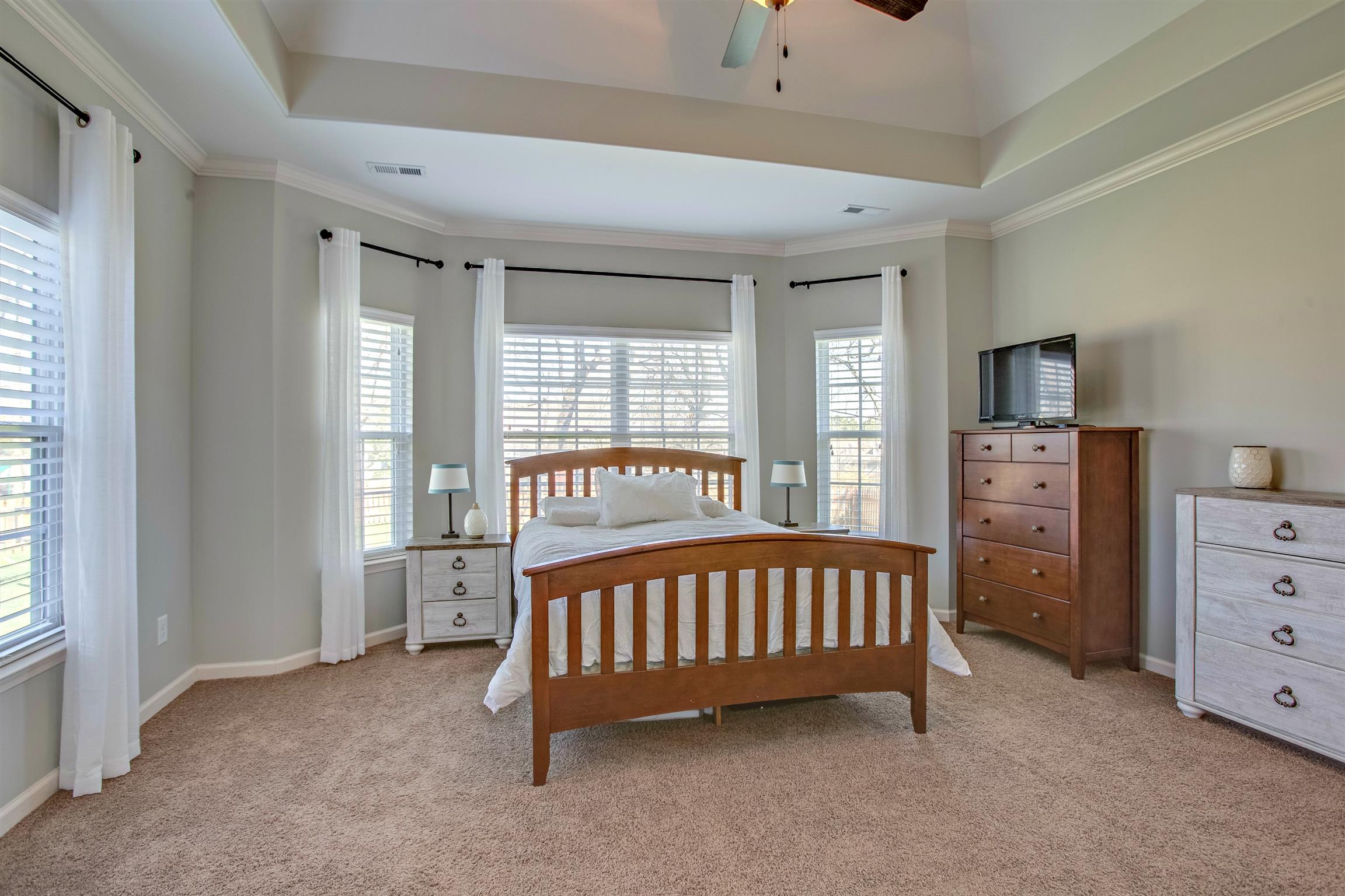 1080 Golf View Way Spring Hill, TN 37174 - Photo 14 of 28 a bedroom with a bed and a large window