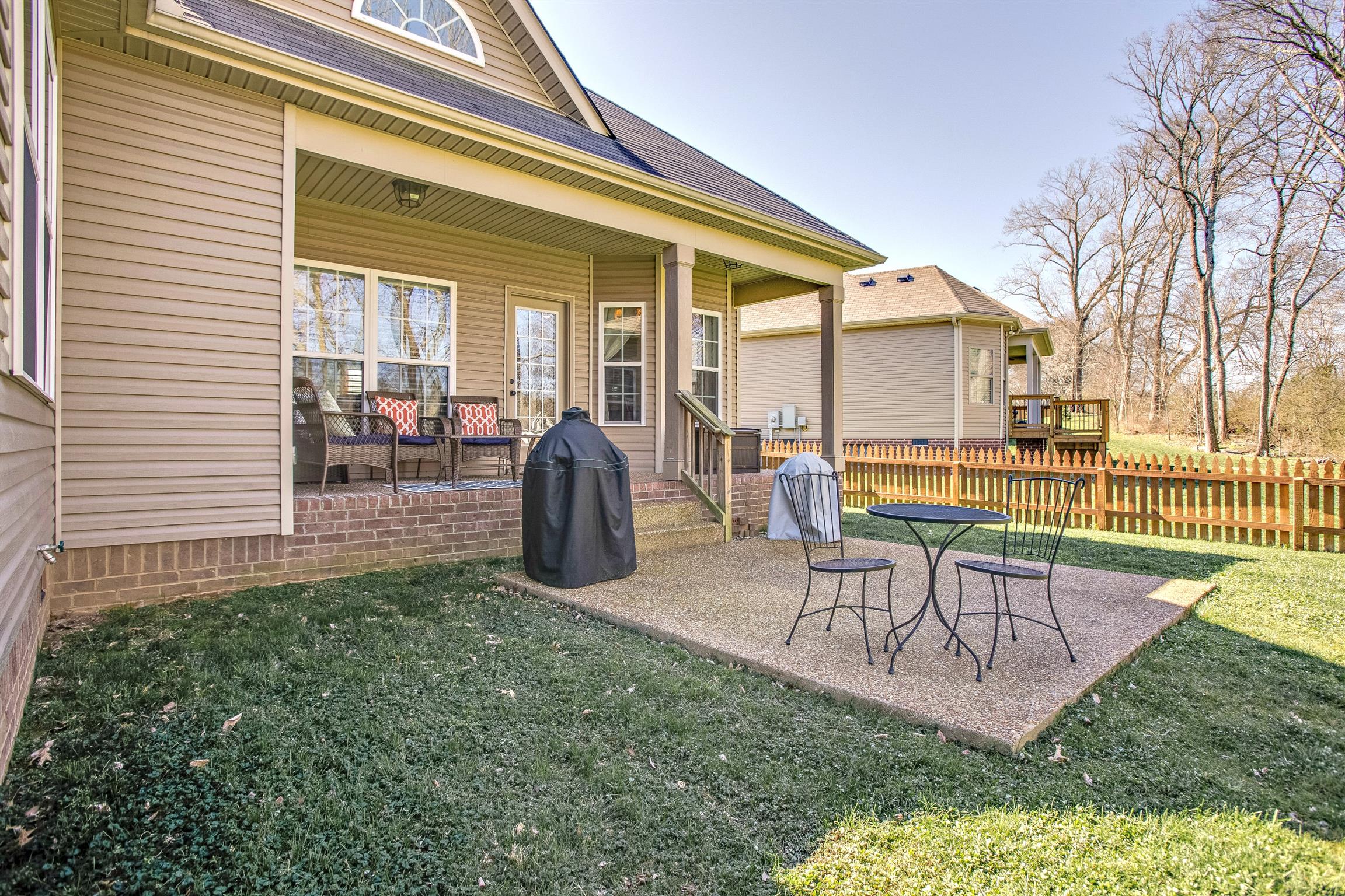 1080 Golf View Way Spring Hill, TN 37174 - Photo 25 of 28 a view of a house with backyard and porch