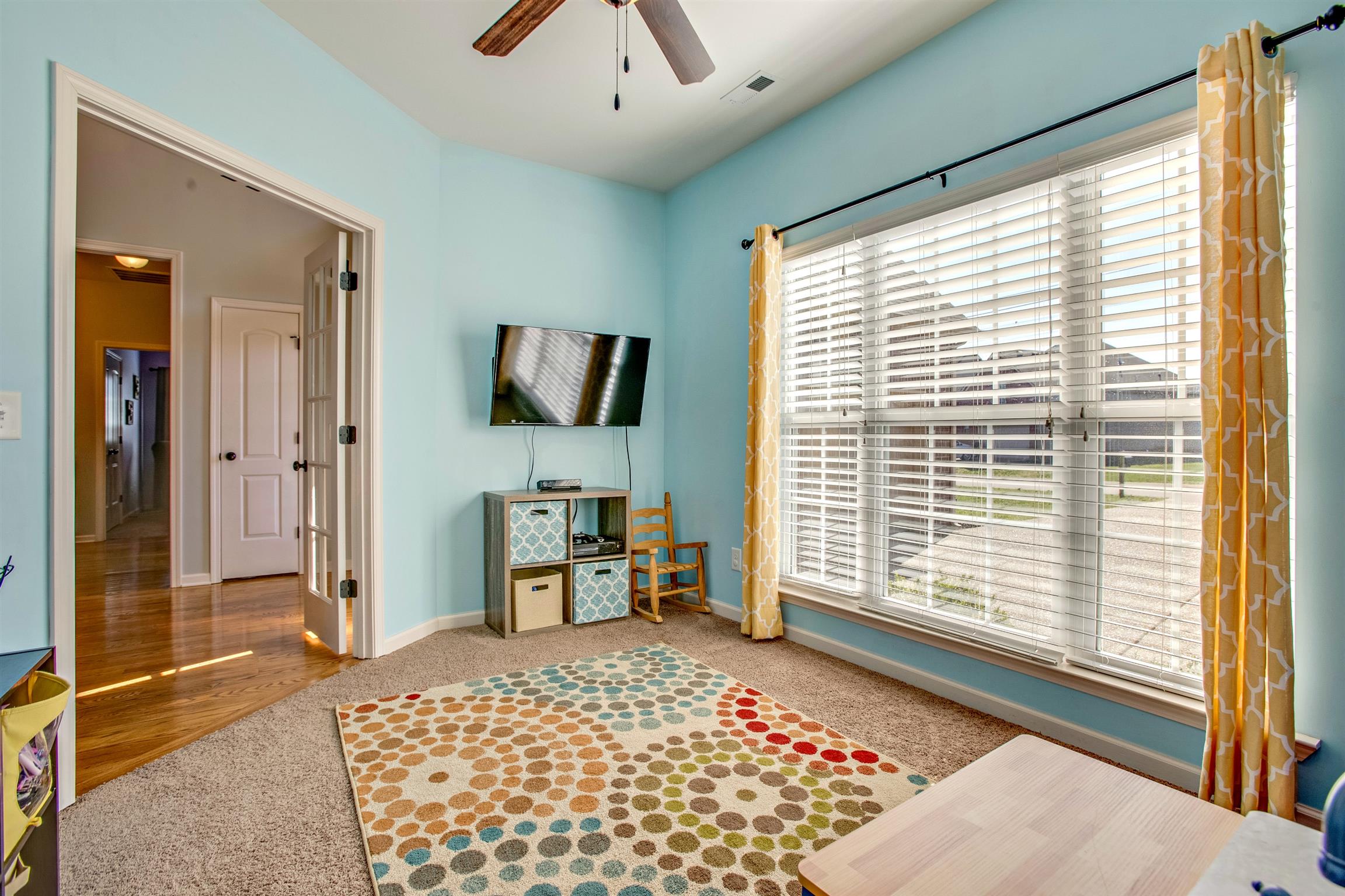1080 Golf View Way Spring Hill, TN 37174 - Photo 5 of 28 a bedroom with furniture and a window