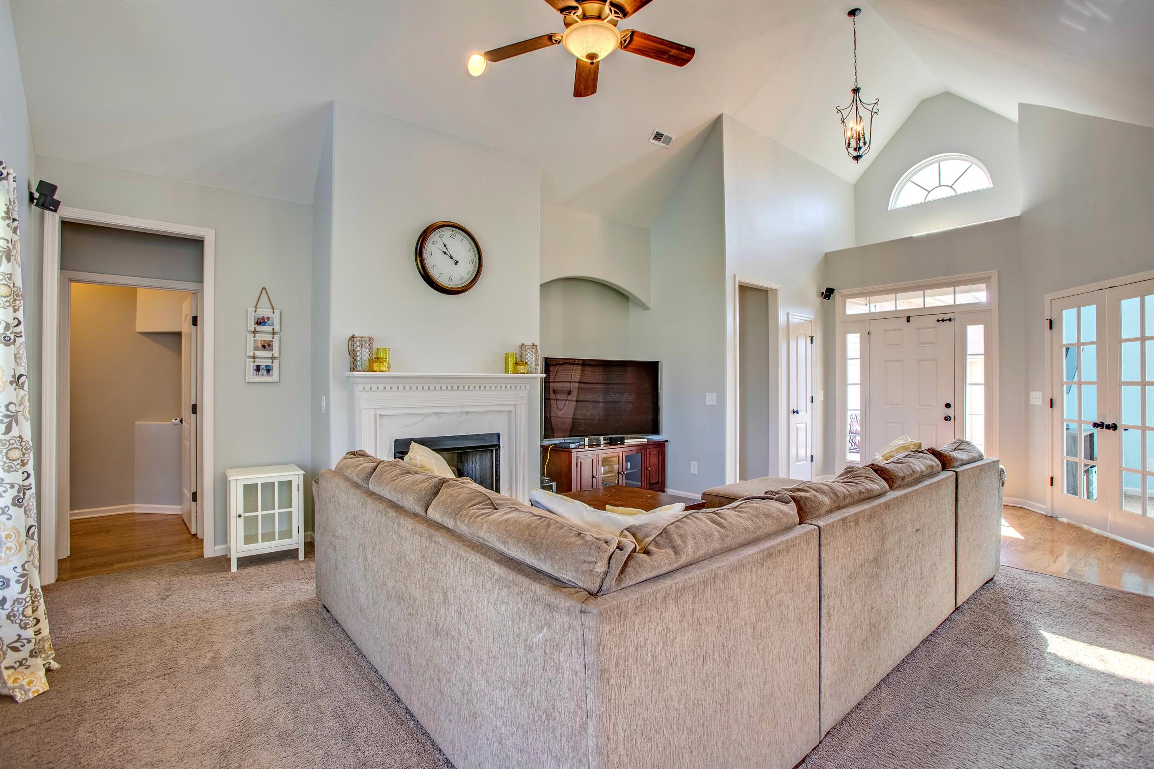 1080 Golf View Way Spring Hill, TN 37174 - Photo 8 of 28 a living room with furniture and a fireplace