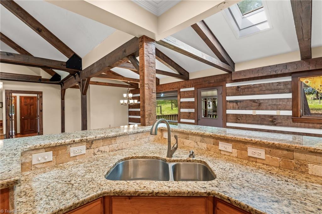 6741 Layton Road Liberty, NC 27298 - Photo 19 of 50 Kitchen is open to the living and dining area.