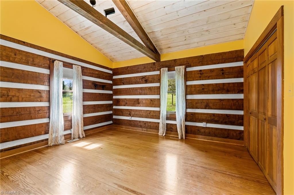6741 Layton Road Liberty, NC 27298 - Photo 31 of 50 Authentic guest room with vaulted ceiling.