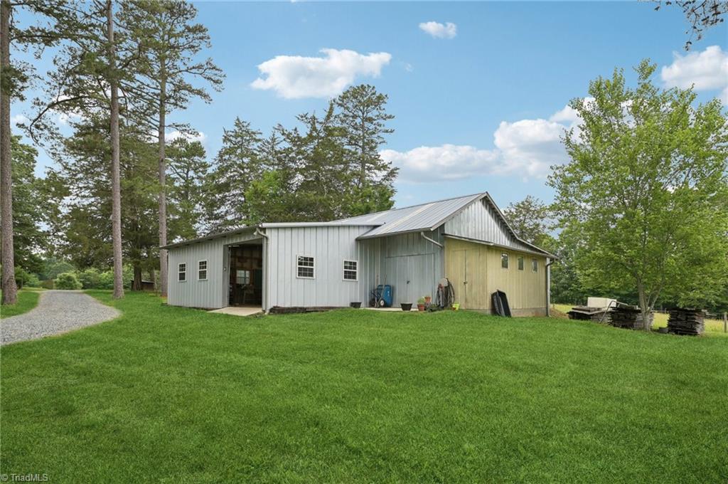 6741 Layton Road Liberty, NC 27298 - Photo 38 of 50 Huge workshop with tons of storage.