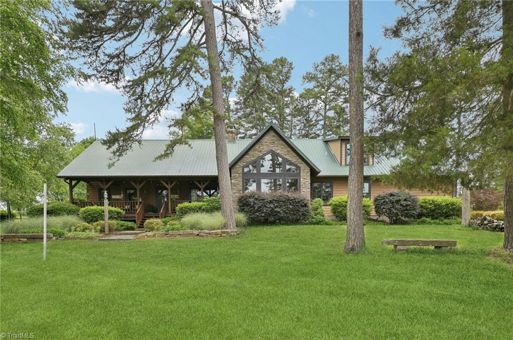 6741 Layton Road Liberty, NC 27298 - Photo 7 of 50 Back porch overlooking the pond.
