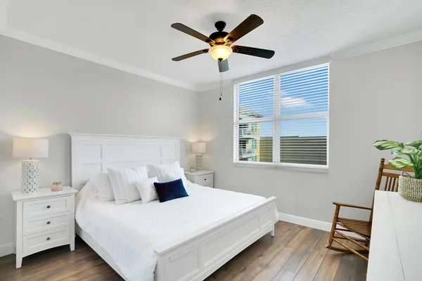 a bed room with bed and window
