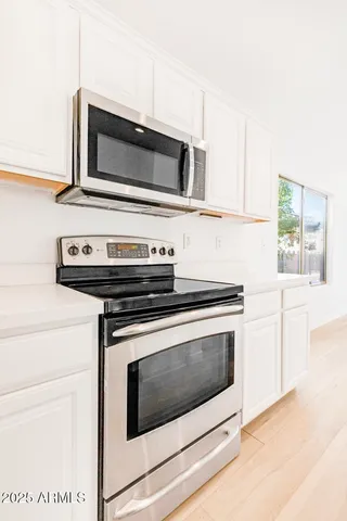 a bathroom with a shower and a mirror